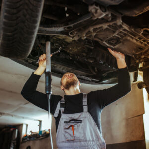 Mechanic working on a car